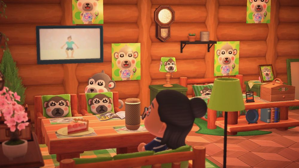 Animal crossing screenshot of Shari in a room where the furniture and walls are plastered with her face on everything as a design.