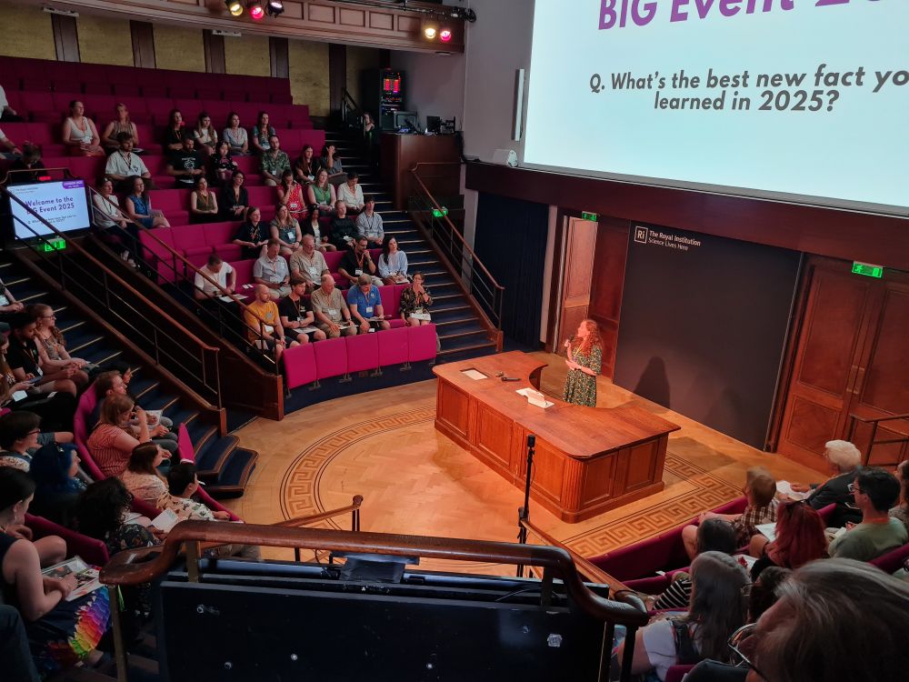 A speaker on stage at the Royal Institution