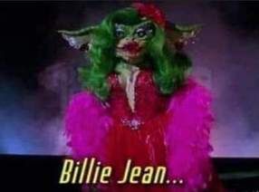 Looks like Yoda in drag, pink feather boa and green hair

Billie Jean... .