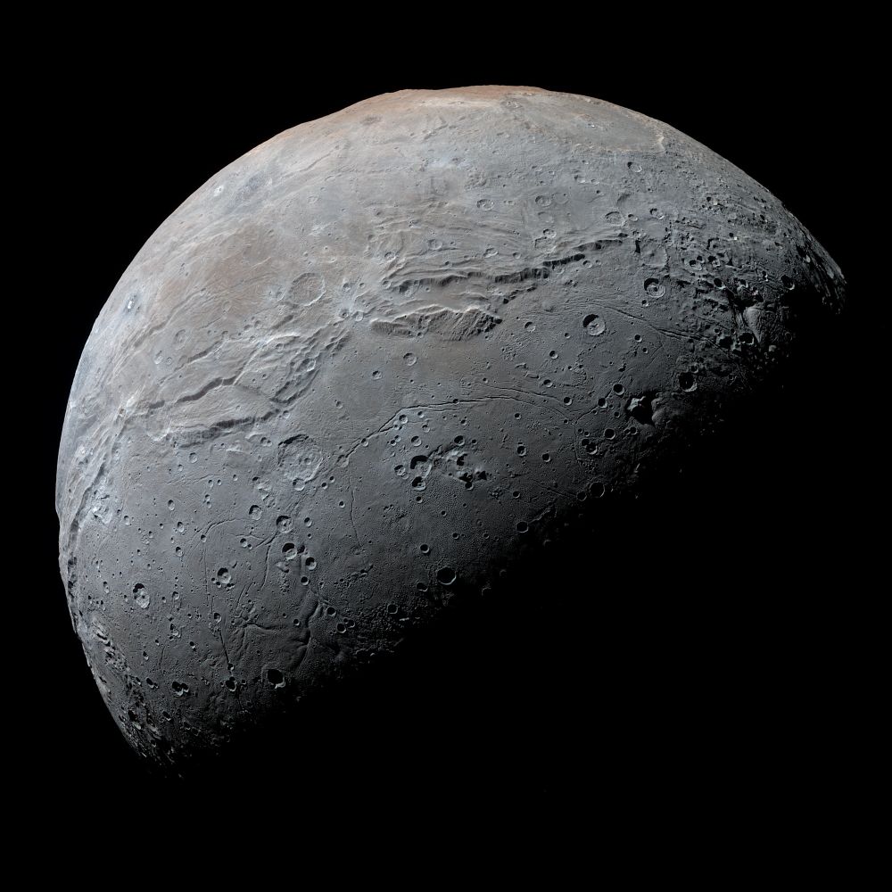Color image of Pluto's moon Charon from MVIC camera onboard New Horizons spacecraft. Image is showing half of the Charon's disc at resolution 650 meters per pixel.