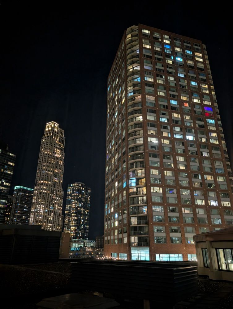 Several Chicago skyscrapers at night