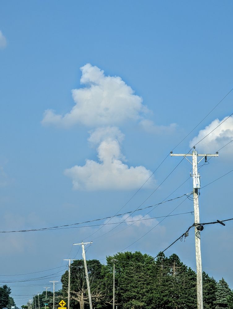 This cloud looks like a white fluffy anal plug.