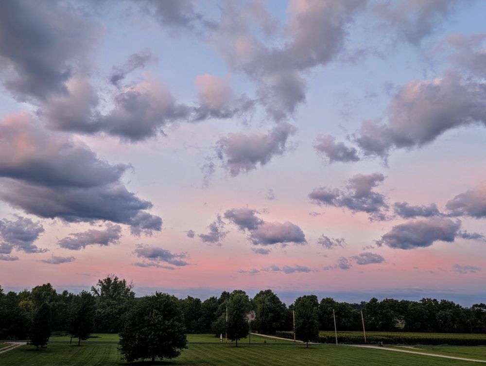 There are pink and blue bands in the morning sky. And clouds!