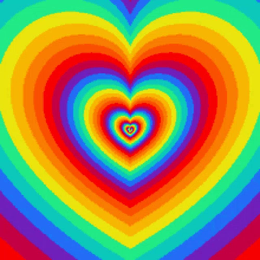 a rainbow heart is surrounded by other hearts