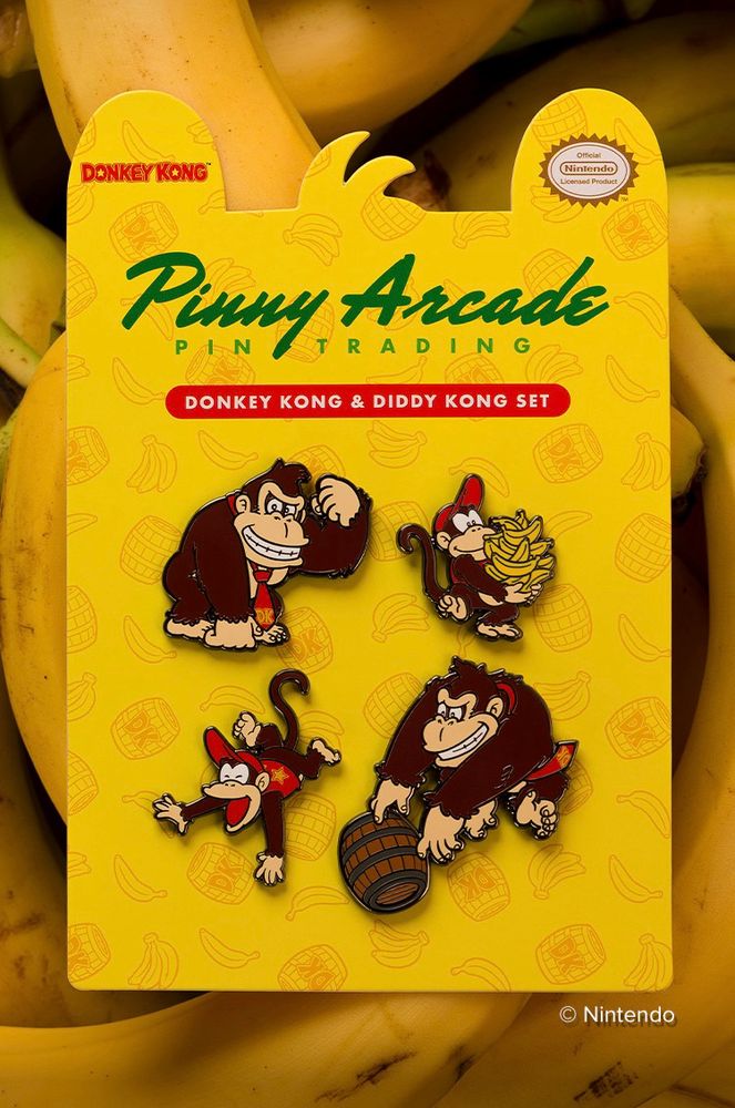 A photo of the Donkey Kong & Diddy Kong 4-pin Set resting on a field of bananas.