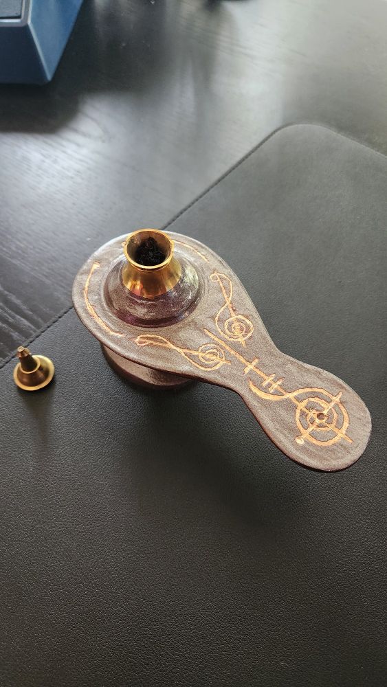 An oil lamp made to look like Tuvok's from the Show Star Trek: Voyager  (top profile)