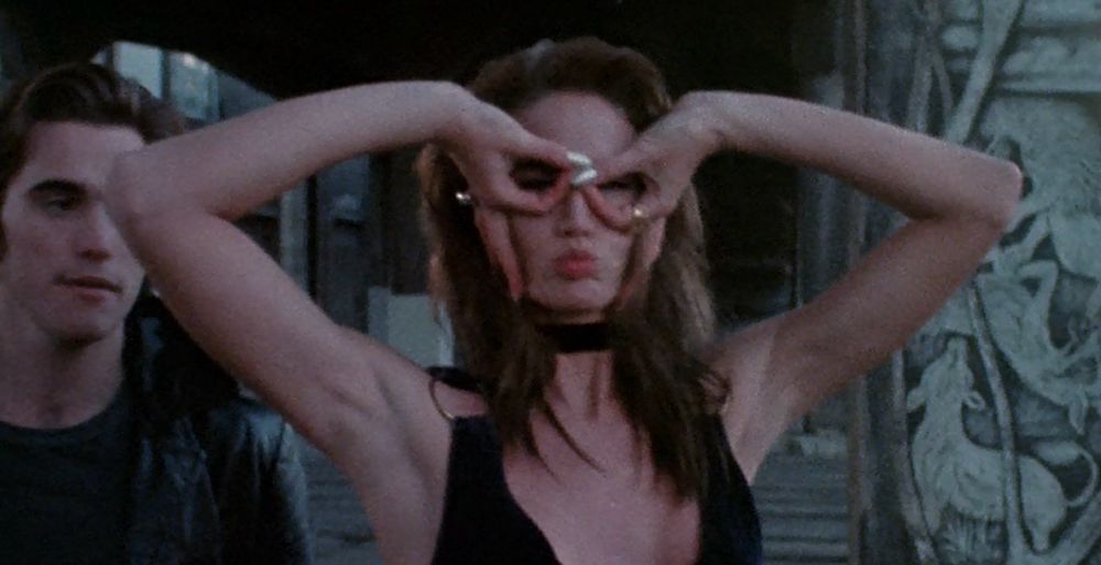 Kelly Lynch and Matt Dillon in a scene from ‘Drugstore Cowboy’ in front of the Lovejoy Columns.