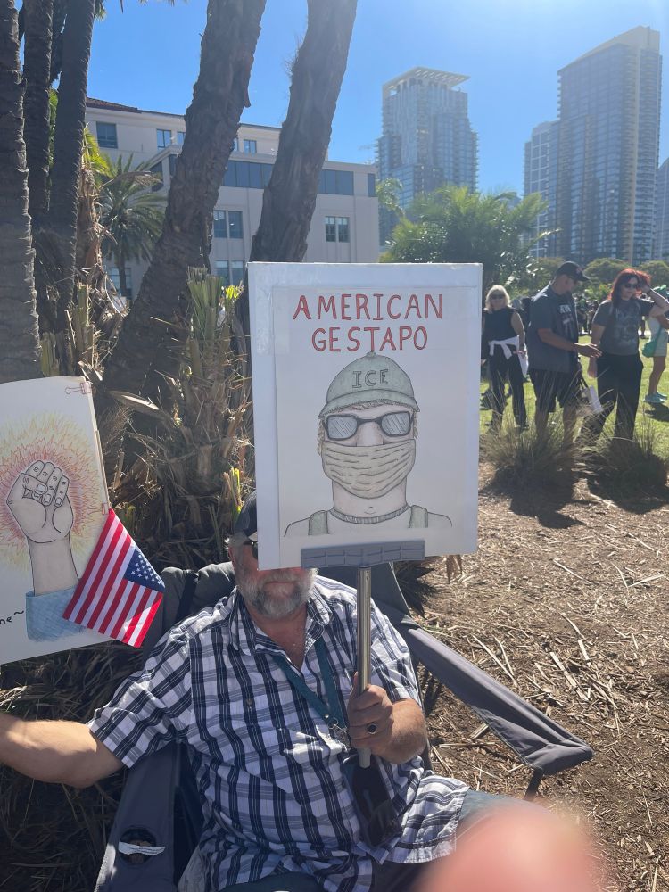 American Gestapo sign with an ICE Agent