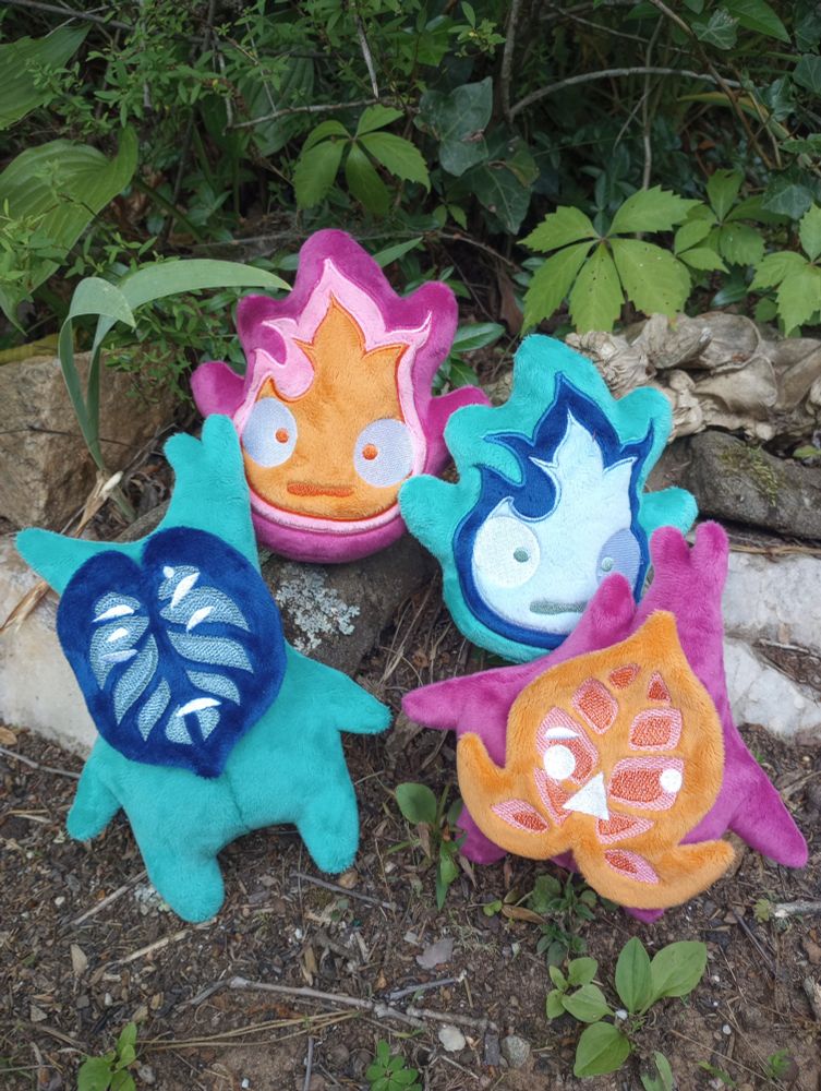 Handmade MLM/Gay and Lesbian Pride plushies.  Includes Koroks from the Legend of Zelda and Calcifer from the Studio Ghibli movie Howls Moving Castle.