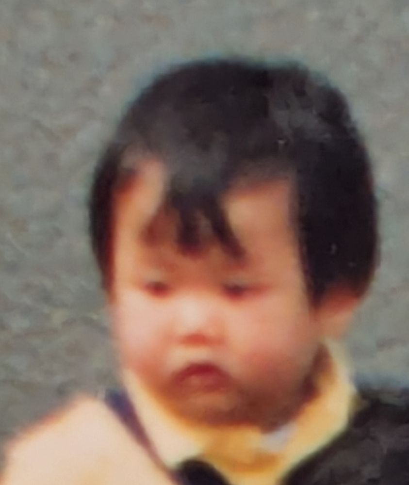 Photo floue de moi, âge de probablement moins d'un an.