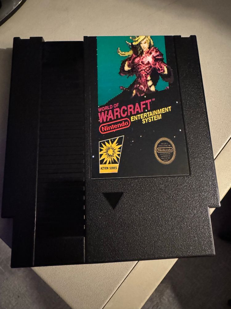 World of Warcraft for the NES, with a label done like a black box game. Thats the joke. Its obviously some sort of bootleg. Its pretty decent though!