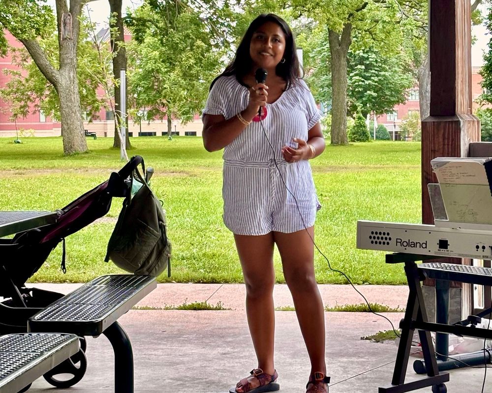 Aurin Chowdhury speaking at the SD63 DFL summer potluck & picnic fundraiser 