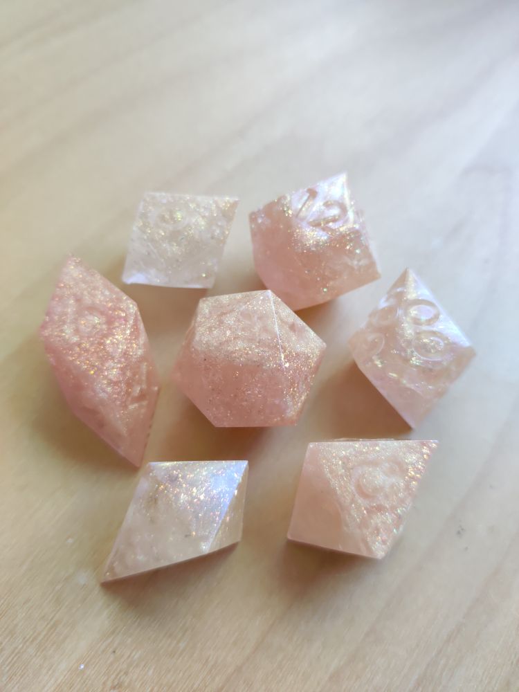 the full set of dice arranged neatly