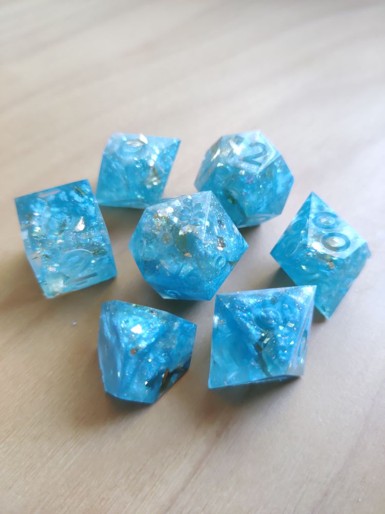 set of sparkly blue dice 