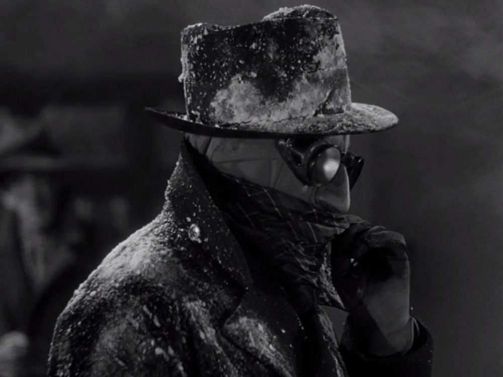 Dr. Jack Griffin (in his full getup, with the jacket and top hat) in The Invisible Man (1933)