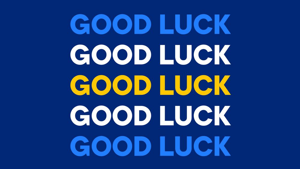A navy blue graphic with the phrase 'good luck' repeated five times in alternating font colours, including light blue, white and yellow.