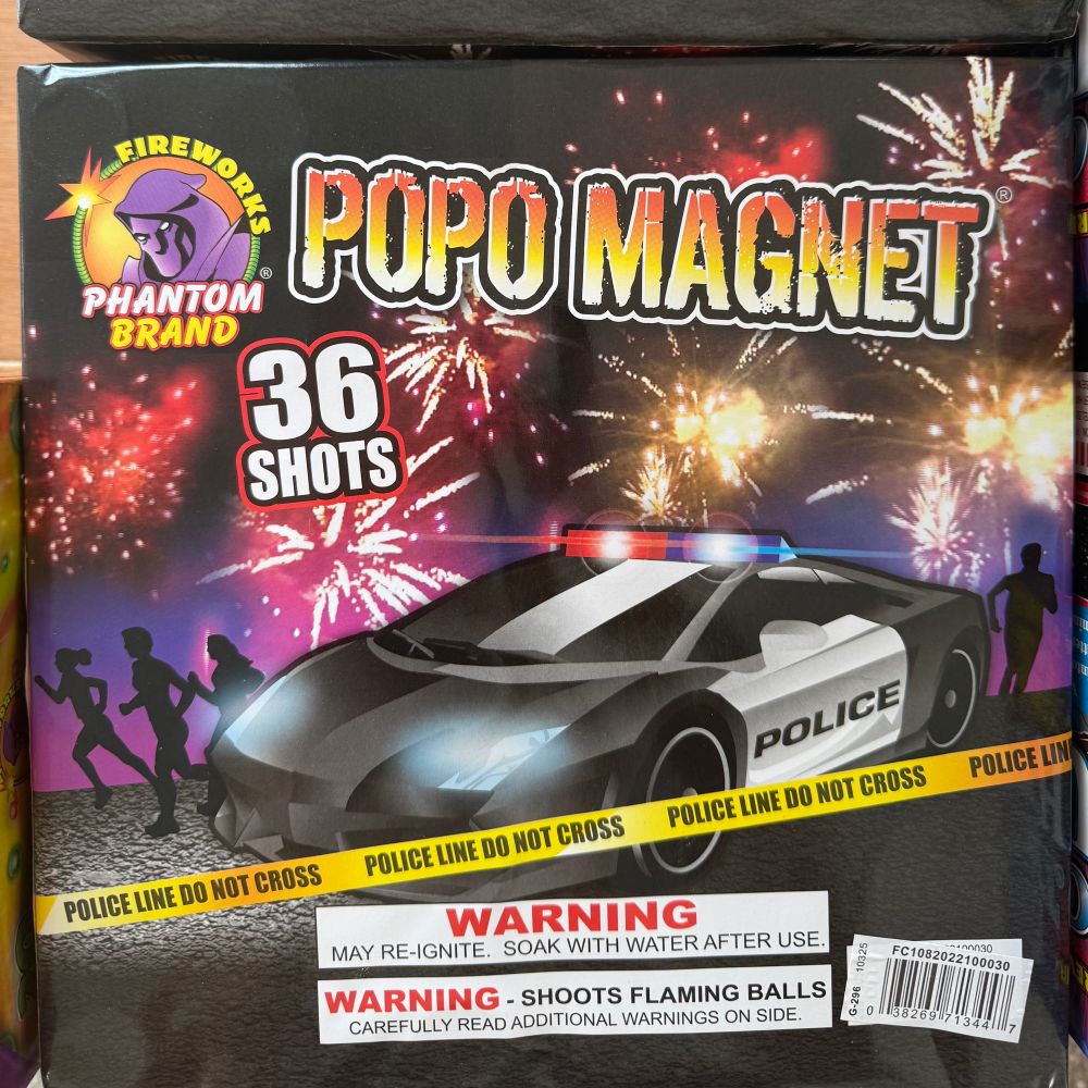 A box of fireworks called “Popo Magnet” with an exotic police car on the front