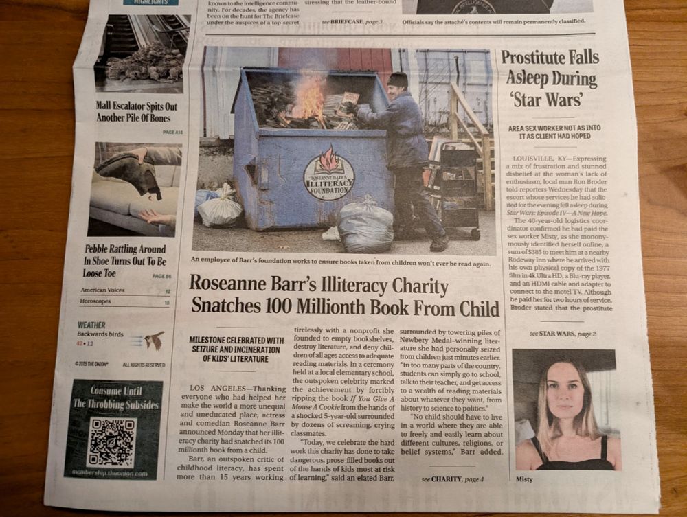 Photo of a print copy of The Onion. Headlines are "Roseanne Barr's Illiteracy Charity Snatches 100 Millionth Book From Child" and "Prostitute Falls Asleep During 'Star Wars'"