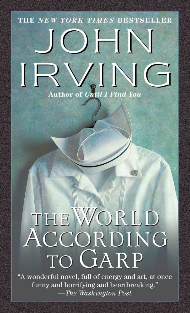 Cover of the novel “The World According to Garp” by John Irving, featuring a photo of a mid-20th century nurses uniform and cap on a wire clothes hanger on a wall hook. 