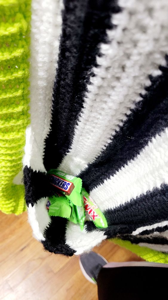 A secret inside pocket filled with halloween candy.