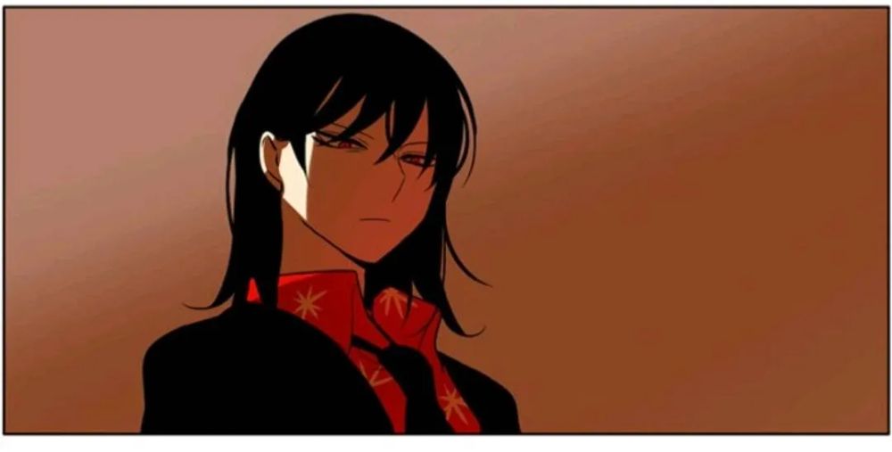 Screenshot of a panel from a manhwa of the character Dana looking stern. Her hair is black and is shoulder length. She wears a black blazer, red floral shirt, and black tie. Her face is in shadow.