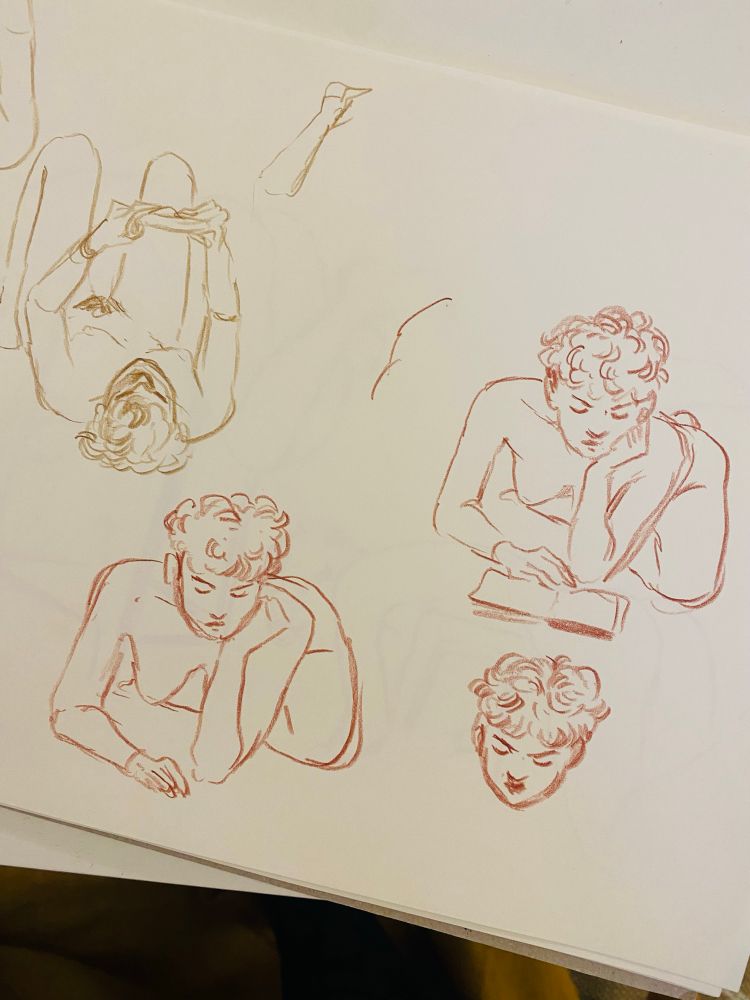 Rough sketch drawing a woman posing naked, reading a book on the floor in various positions 