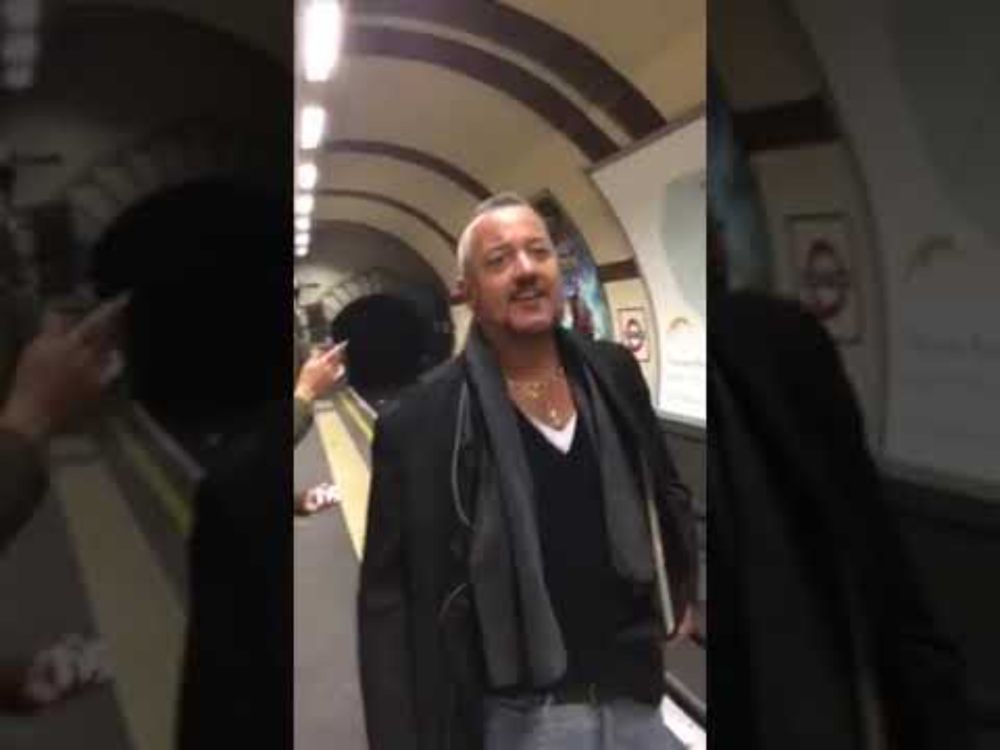 Neil Francis singing on London Underground