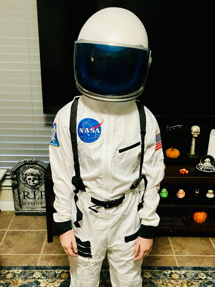 Kickass kiddo in an astronaut costume