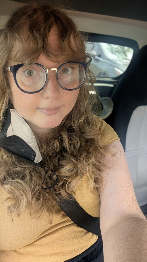 a selfie of me in Sage's car. 