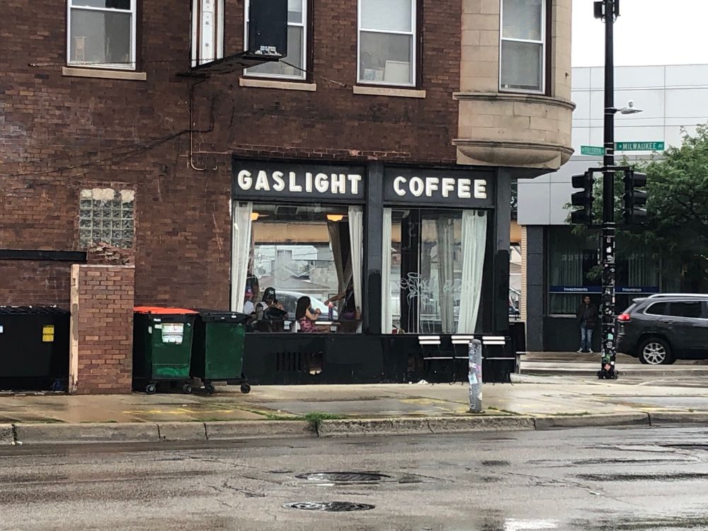 A photo of a corner coffee shop named Gaslight Coffee.