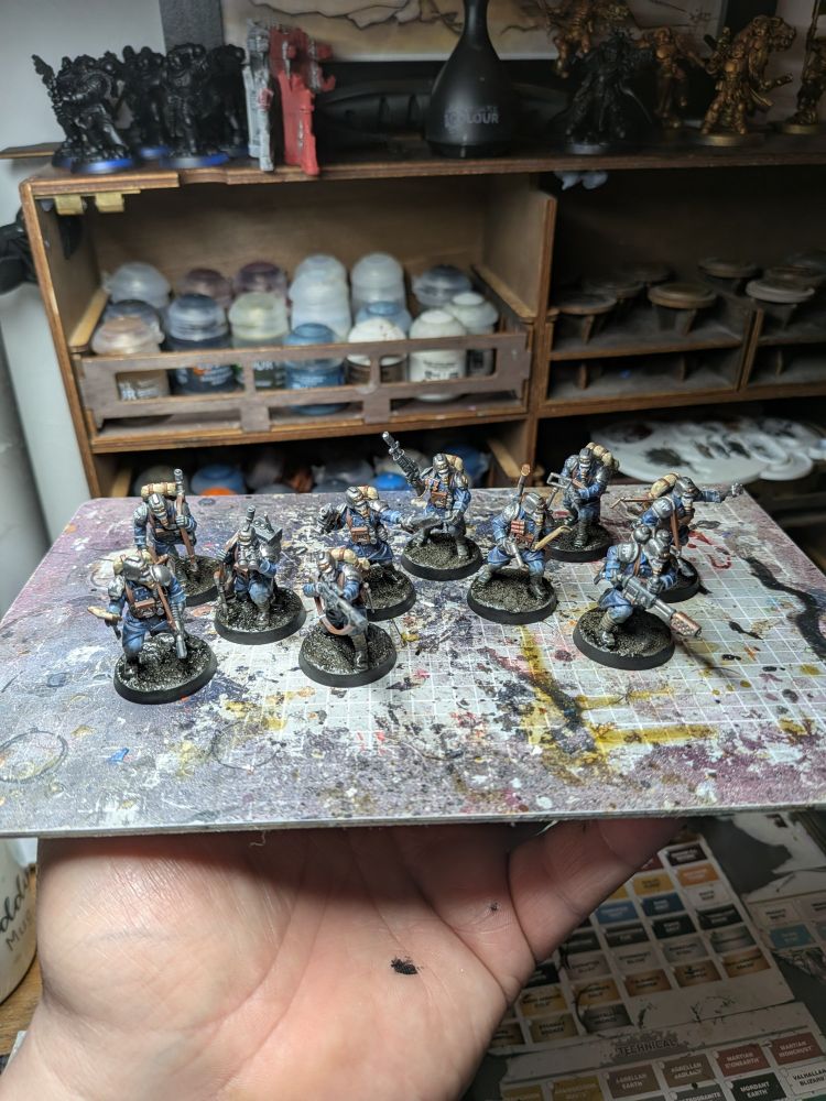 A Death Korps of Krieg Kill Team painted in the colours of the 143rd Siege Regiment. 