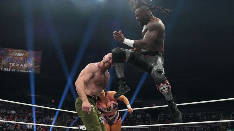Swerve Strickland kneeing Jon Moxley in the head at the AEW Dynasty PPV in 2025. Photo credit I believe goes to Lee South.