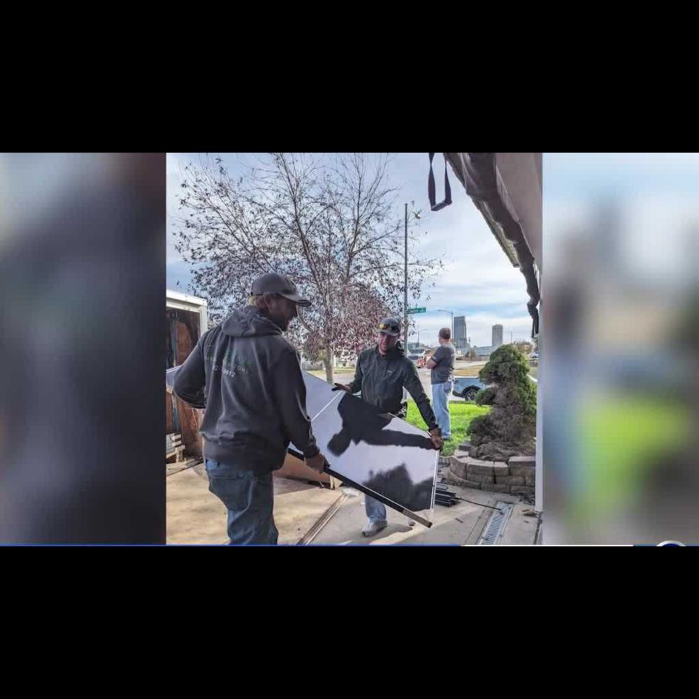 Habitat for Humanity installs solar panels at Omaha woman's home for pilot program