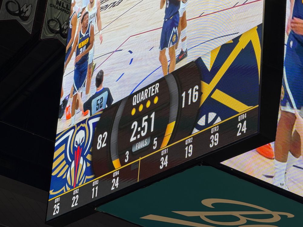 Picture of the scoreboard which shows the Nuggets leading 116-82 in the fourth quarter. Of note the Nuggets out scores the Pelicans 39 to 11 in the third quarter.