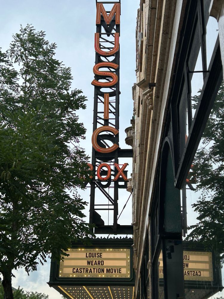 The marquee of the Music Box theater, with 

Louise
Weard
Castration Movie


Spelled out in letters 