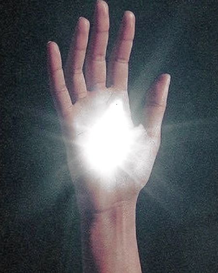a upheld hand with glowing light emerging from the palm