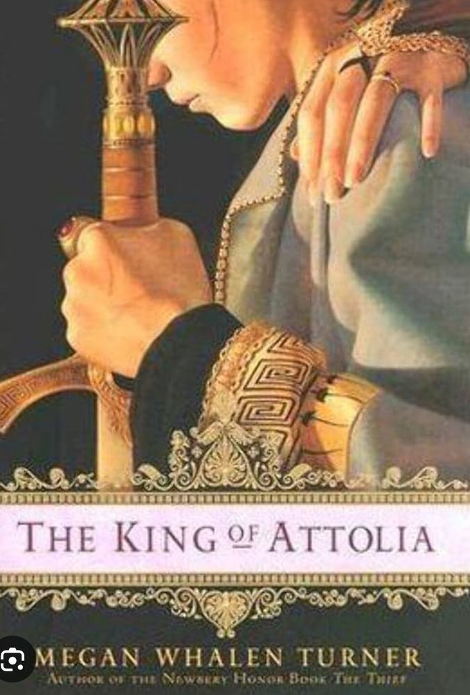 Book cover of King of Attolia by Megan Whalen Turner. A man holding a sword, face not shown, and a woman's hand on his shoulder.