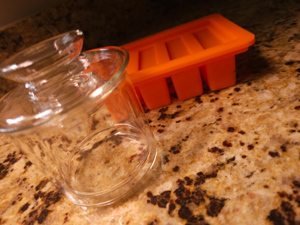 Clear butter bell and orange silicon butter mold