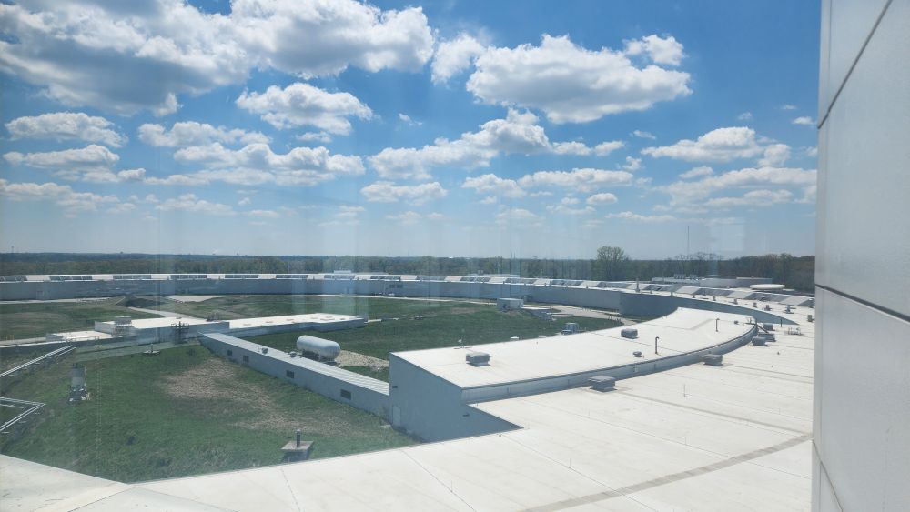 A view of the advanced photon source building,  which houses the 1.1km in diameter APS ring, where 40+ instruments are used to conduct cutting edge X-ray science.  To learn more,  visit lightsources.org and search for the APS.