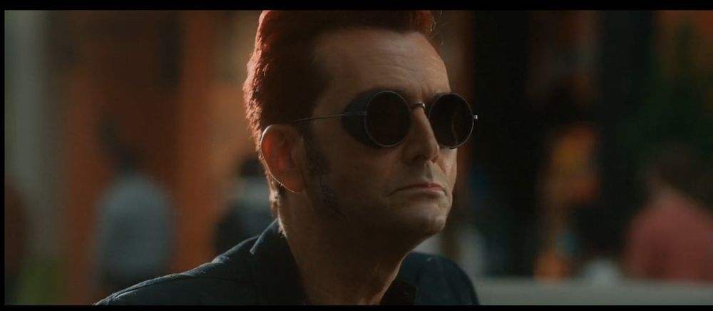 After the final fifteen, Crowley watches Aziraphale get on the lift going up to heaven. 