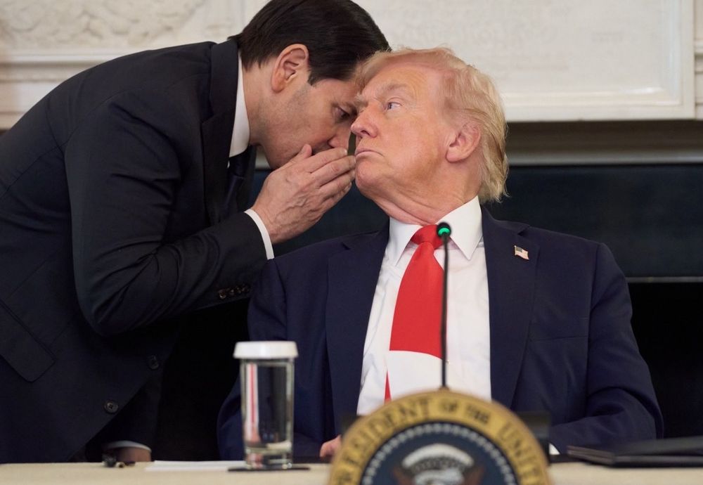 Rubio whispering in Trump's ear