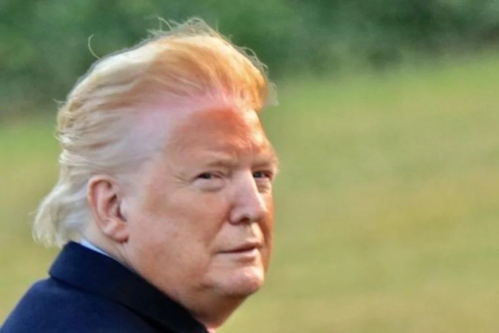 Trump with a laughably clumsy spray-tan line around the edge of his face