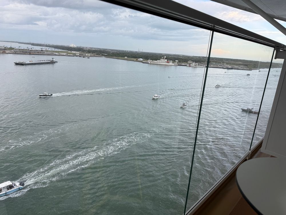 A large number of small boats returning to port after the launch got scrubbed