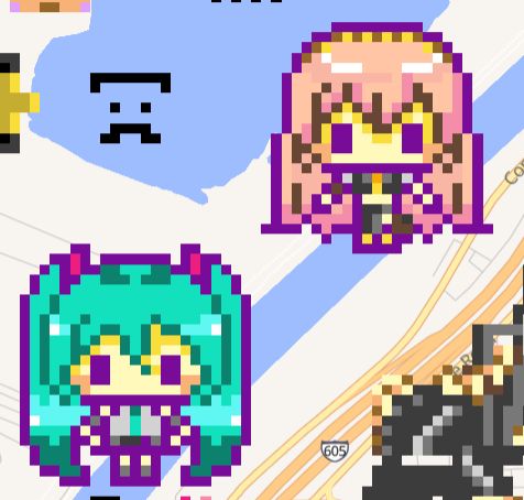 Tamagotchi Hatsune Miku and Megurine Luka next to each other (and a work in progress Minecraft face).