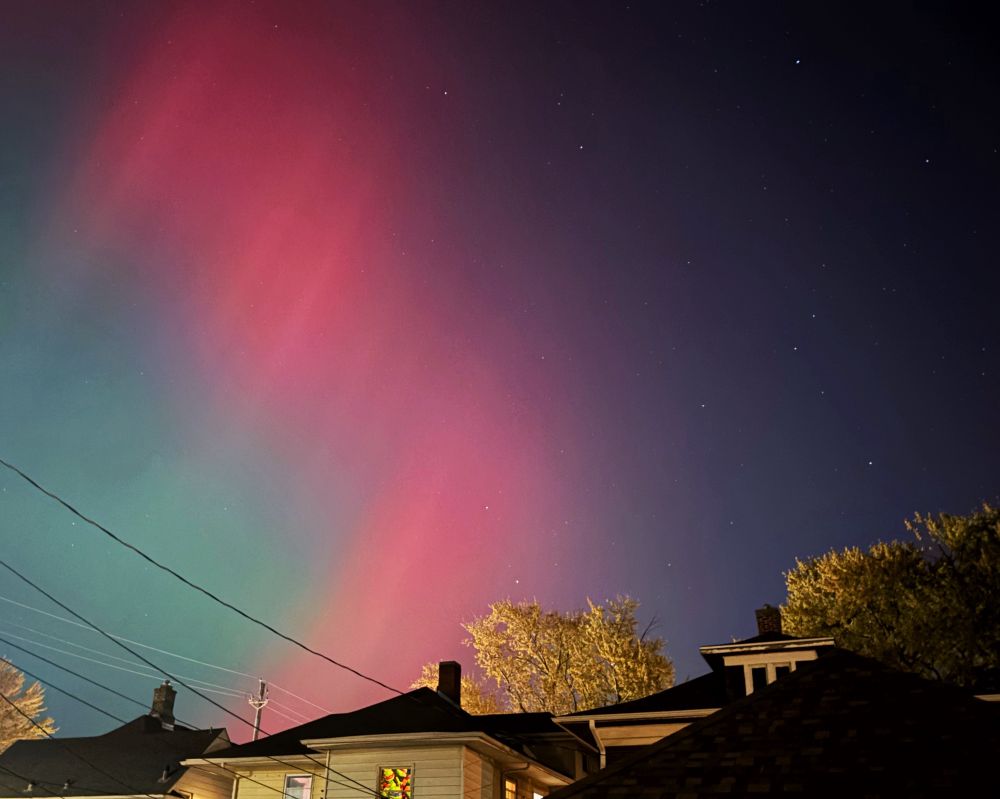 The aurora over roofs