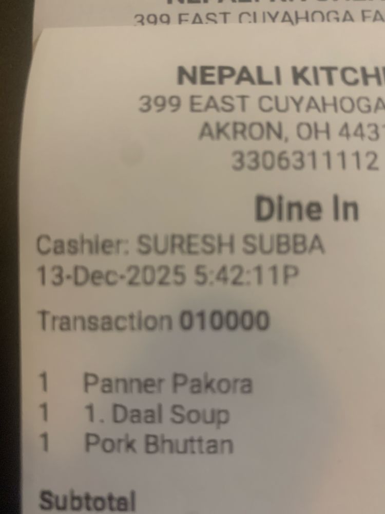 Picture of itemized receipt at Nepali restaurant and the transaction number is 010000, implying that I am special