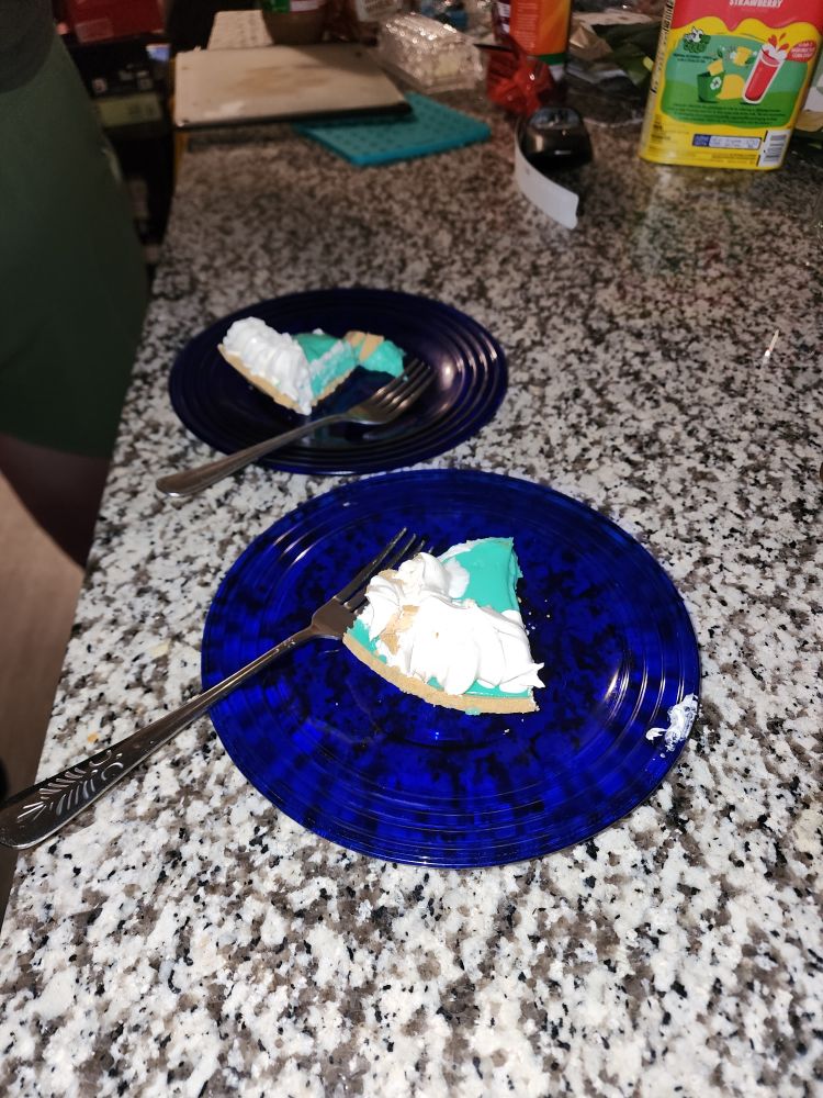 Two plates with slices of Baja Blast pie