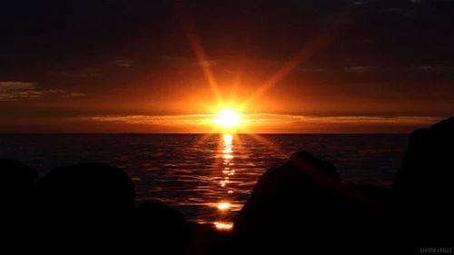 Un voucher de soleil au-dessus de la mer 