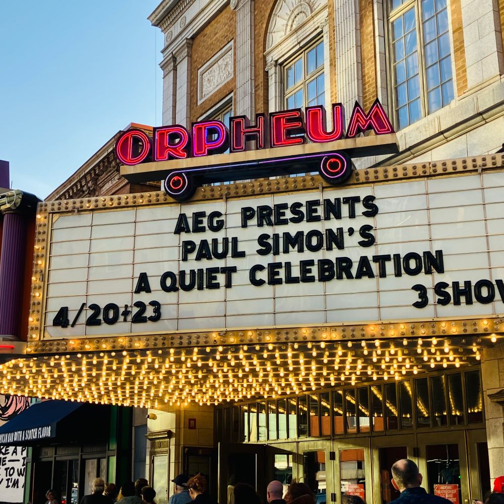 A billboard outside the Orpheum Theater in Minneapolis, Minnesota, advertising concerts by Paul Simon from April 20-23, 2025.