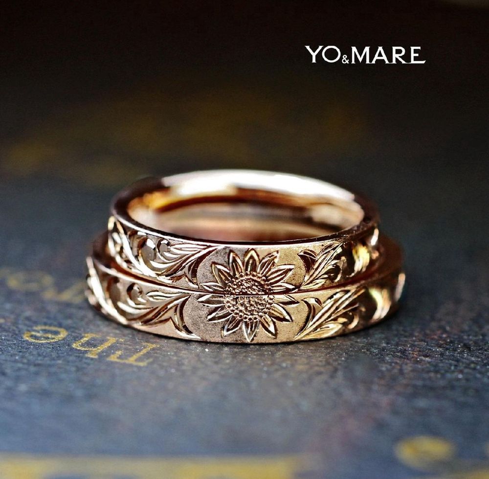 ピンクゴールドのリングを２本重ねてハワイアン模様のヒマワリを描いた結婚指輪オーダー作品